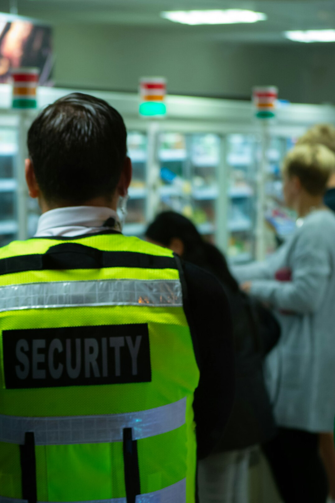 store security guard watching camera