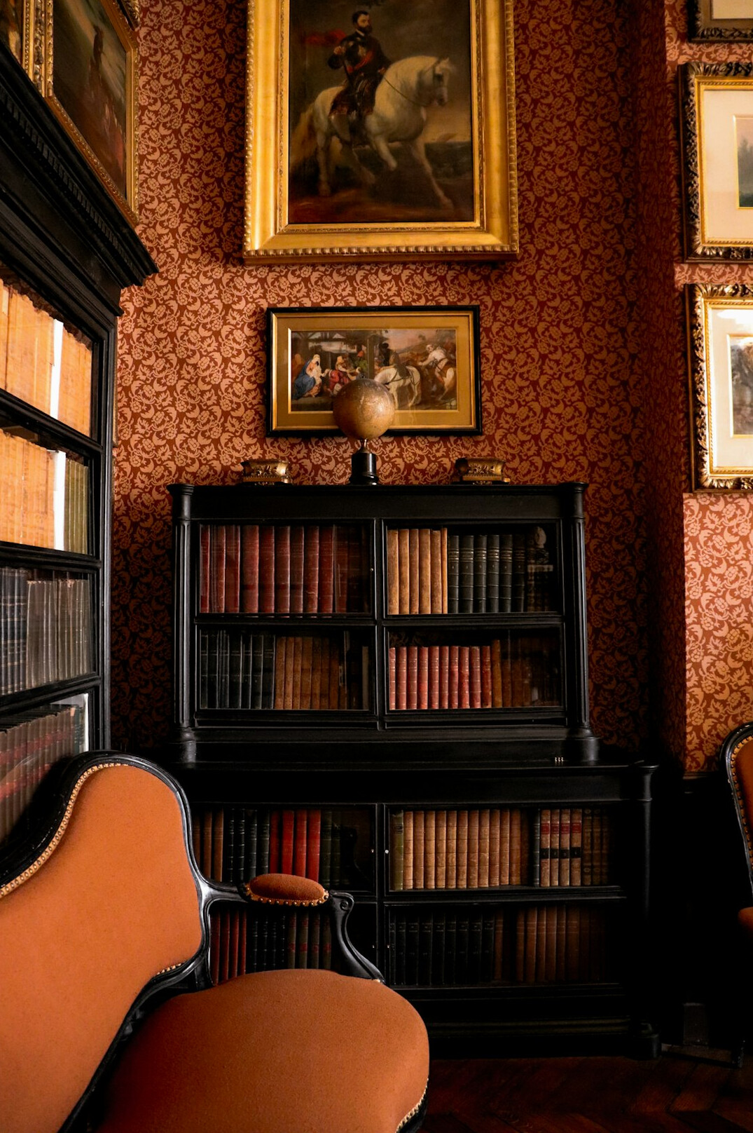 Quiet historic library with tall shelves of old books