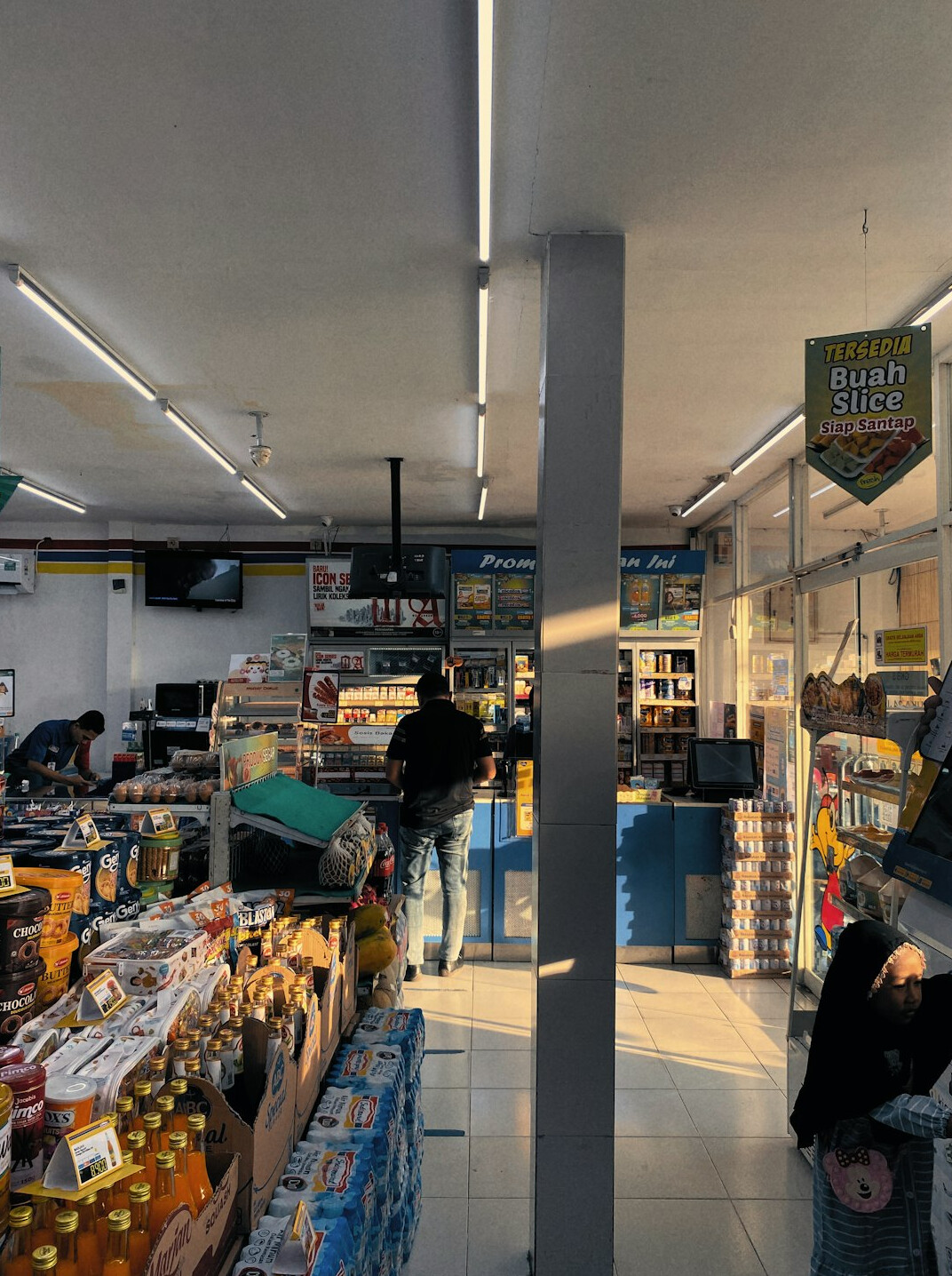 supermarket interior with people