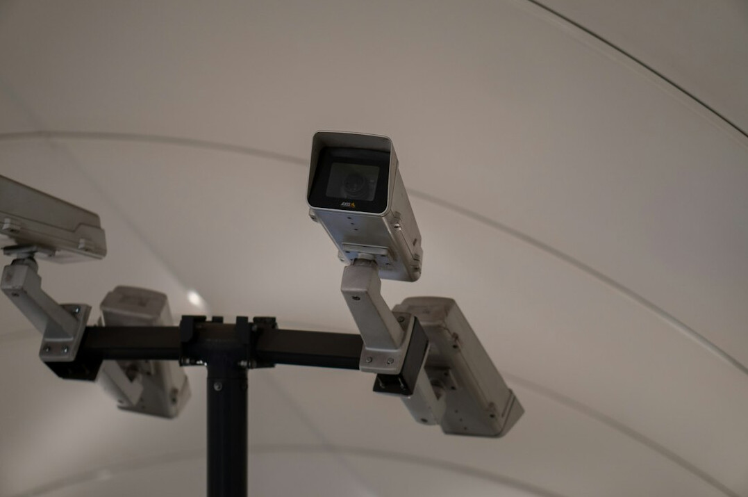 supermarket detective watching cameras