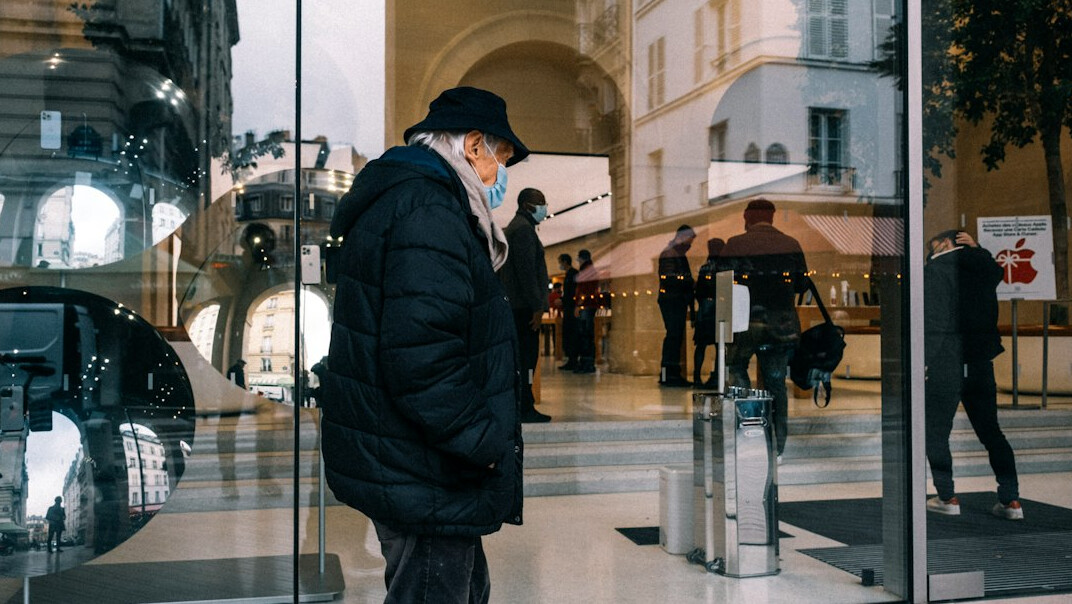 security guard watching shopper