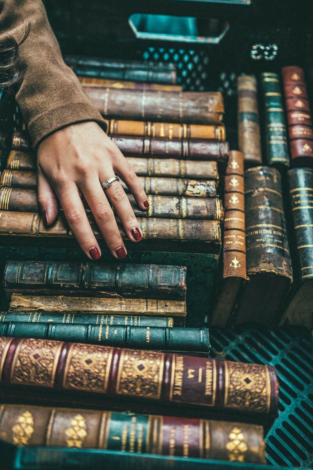Collection of vintage books arranged on a table