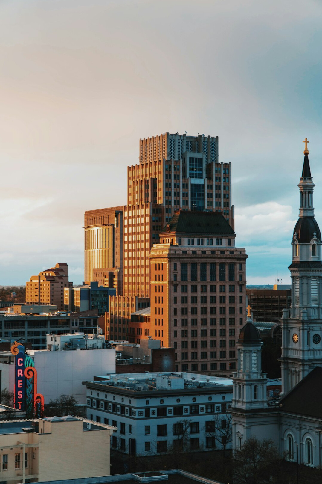 City skyline at dusk with historic buildings